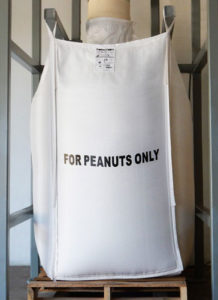 bulk bag on wooden pallet labeled for peanuts only